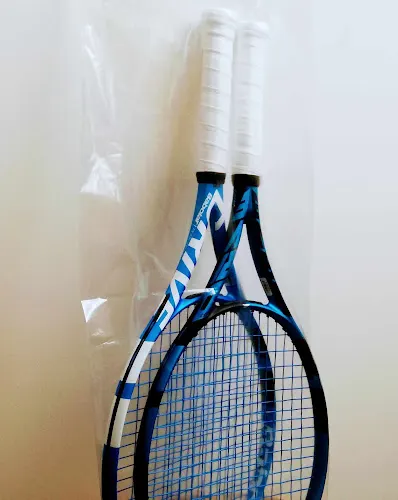 Taller encordado raquetas Madrid . Tenis Ferru - Torrelodones